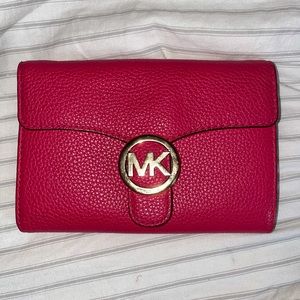 Pink Michael Kors wallet bag